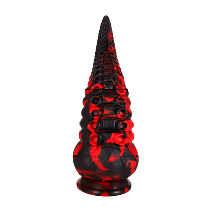 Violetin sävyinen PLEASUREZ Dildo Octopus dildo, värikäs ja monipuolinen seksilelu, näkyvissä kuvan keskellä.